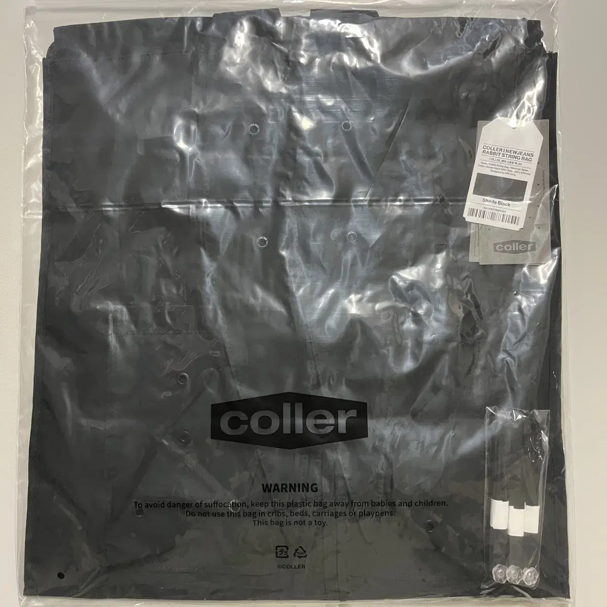 (Unsealed) new jeans x Colette Rabbit String Bag Shade Black Bag