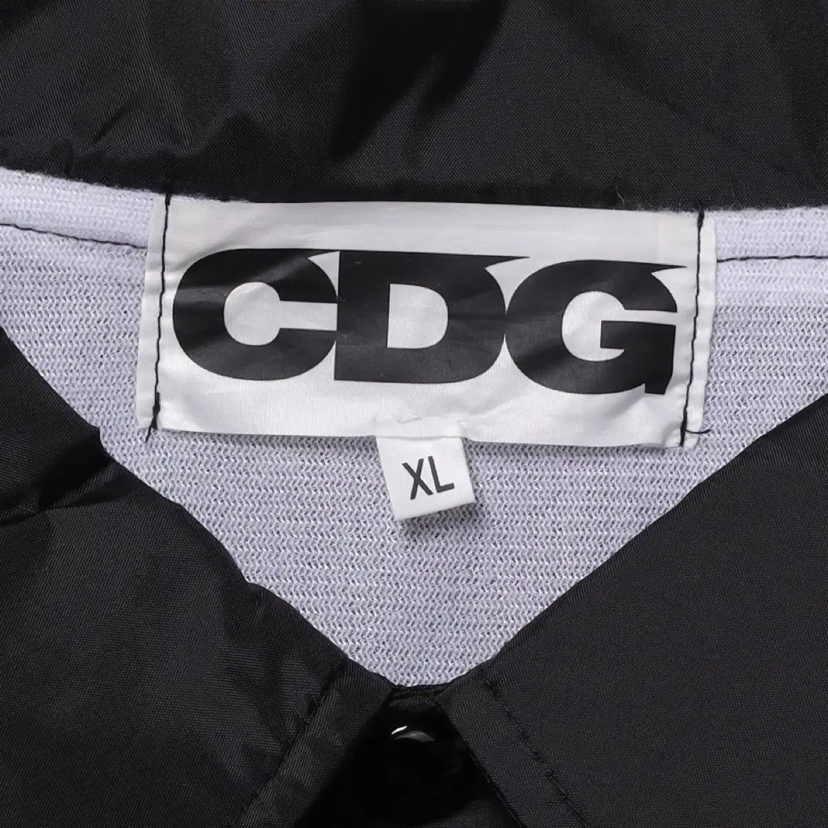 CDG Printed Coach Jacket