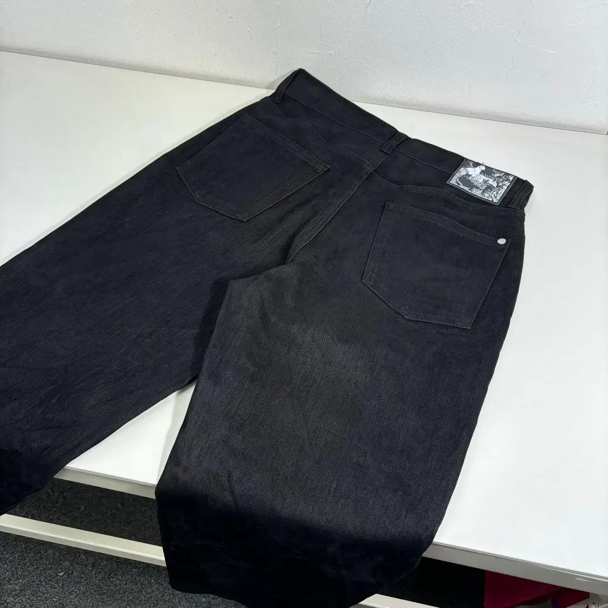 29 Modine Wide-Fit Black Jeans