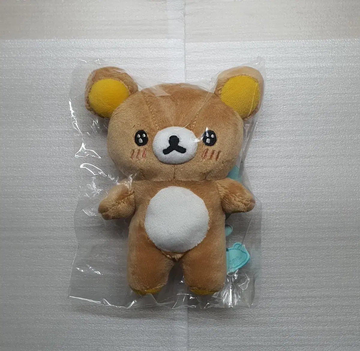 Rilakkuma belly up Manpuku Makumaku mascot doll Nui Sanx