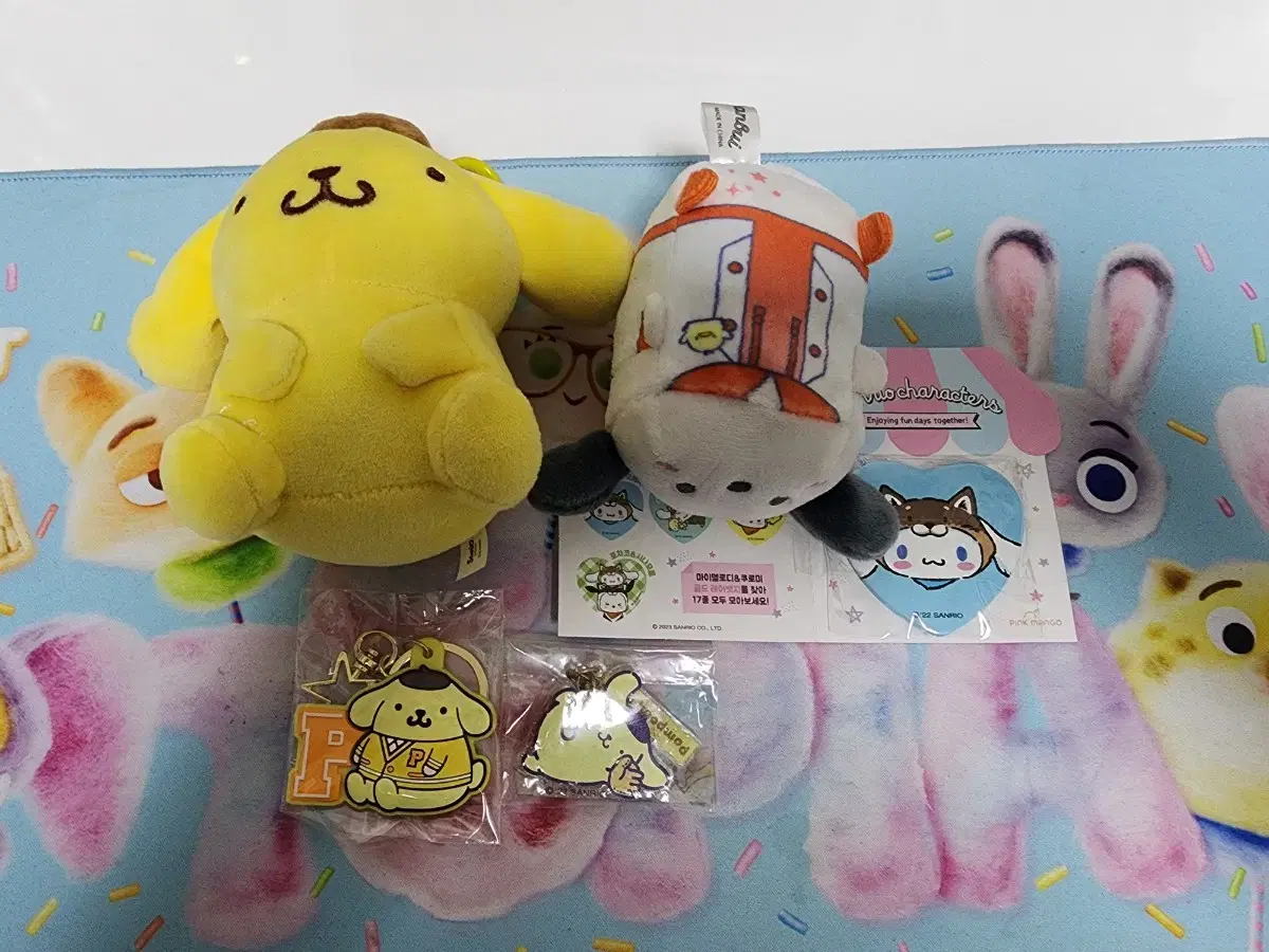 Sanrio Pochaco Cinnamon Roll Pompom Purine Doll, Badge, and Keyring in Bulk