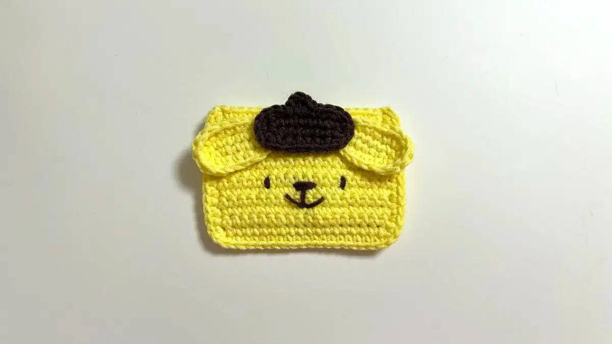 Pompompurin knitted card holder
