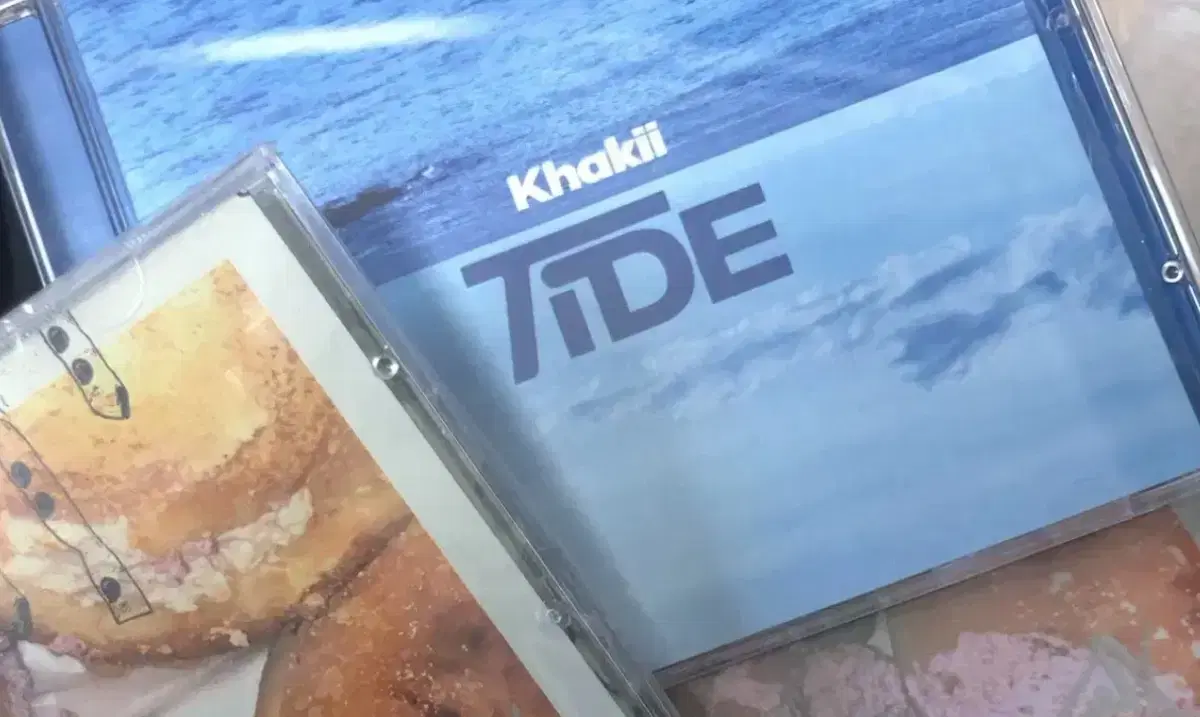 카키 tide 앨범