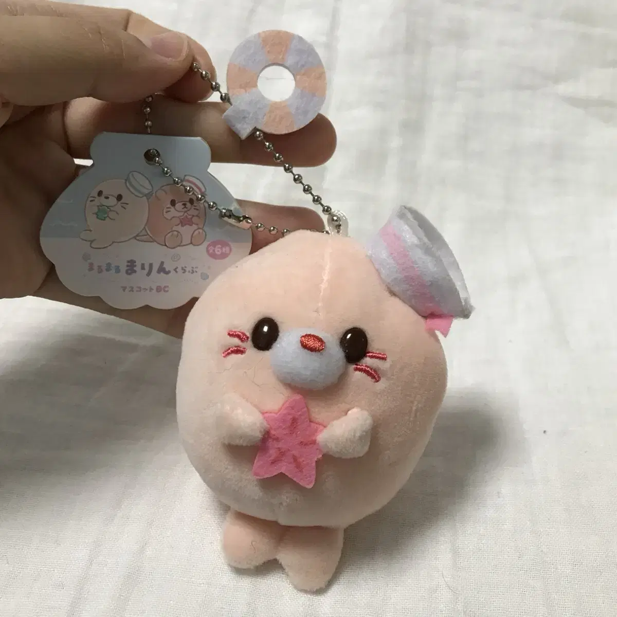 Like an otter, like a seal doll keyring