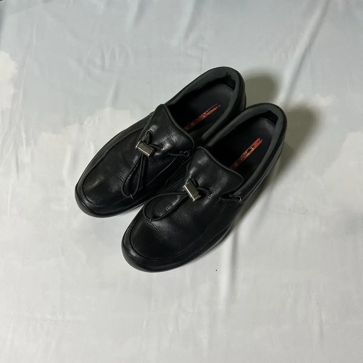 Prada nappa toggle slipon loafers