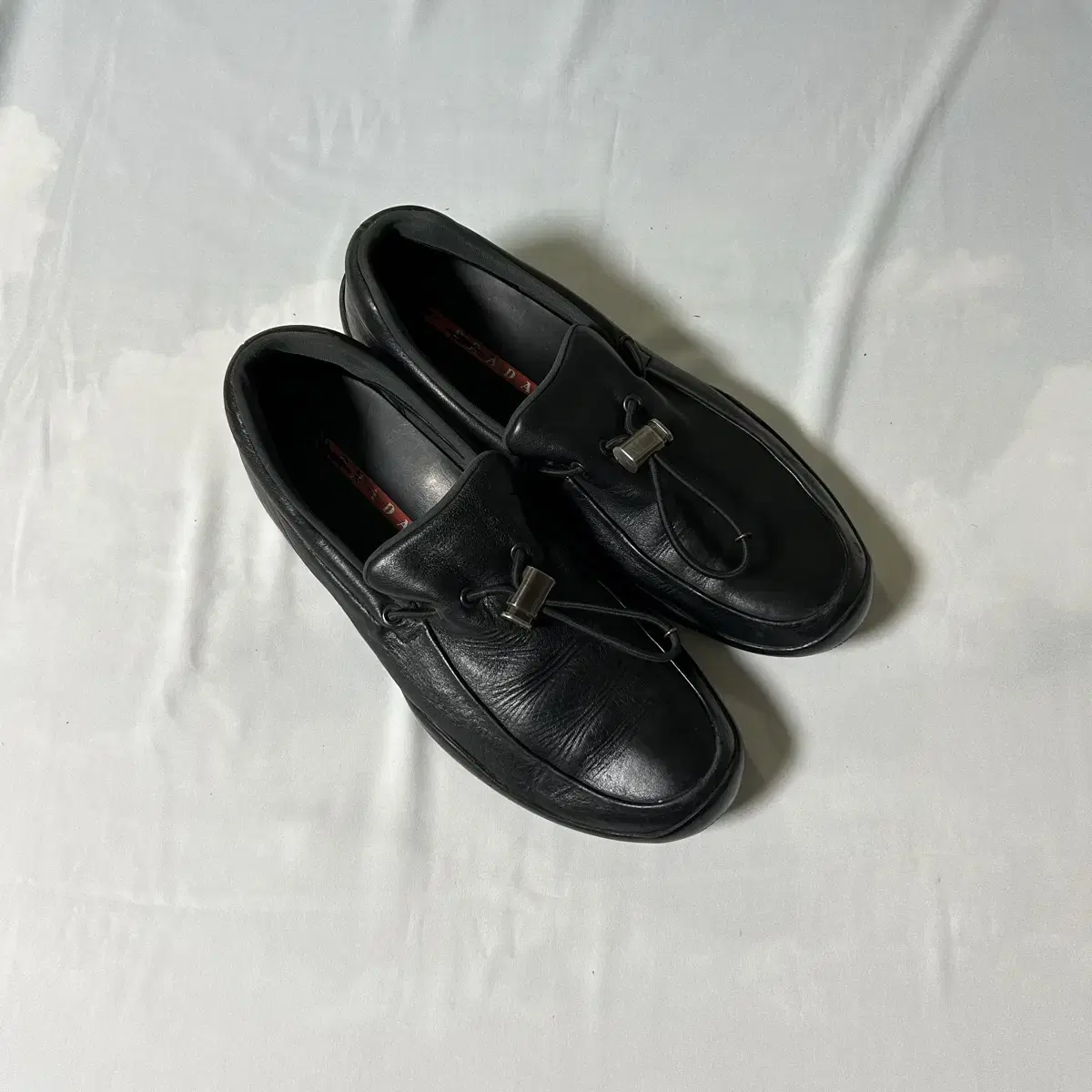 Prada nappa toggle slipon loafers