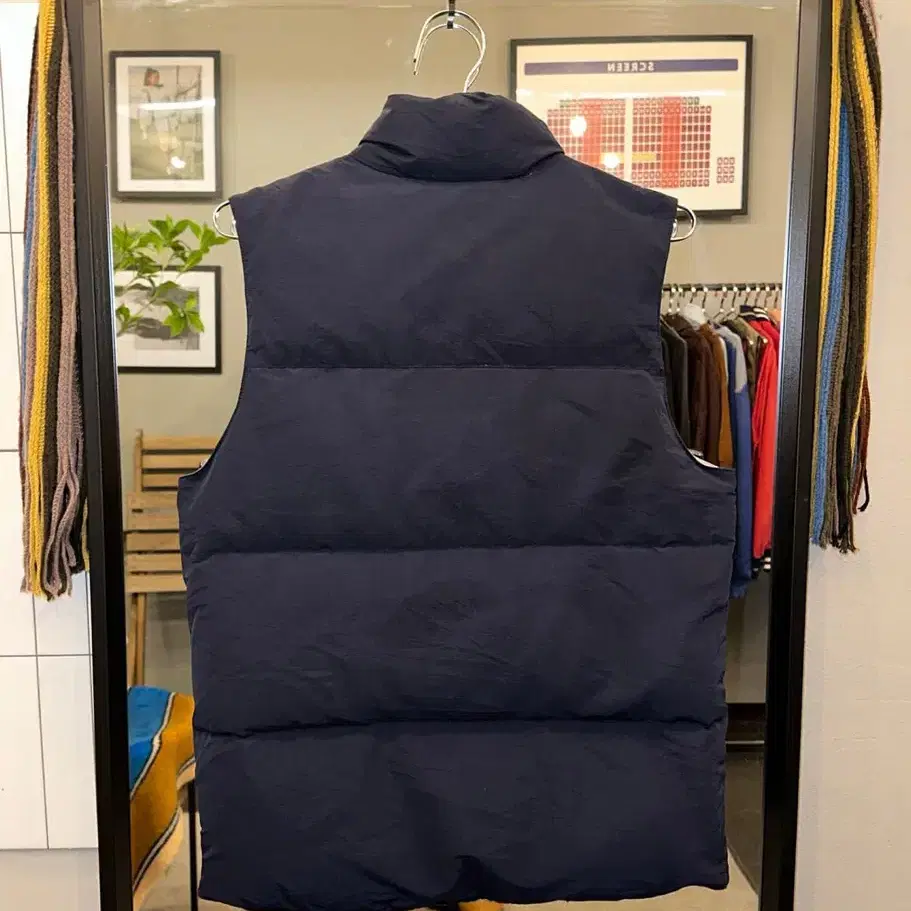 HARE pocket detail padding vest 패딩조끼