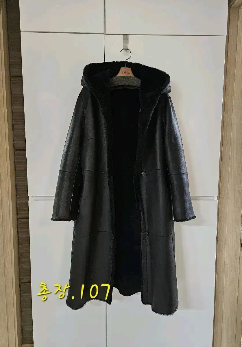 Price drop.Lobo Lamb Reversible Sheepskin Hooded Mustang Long Coat. 77.00