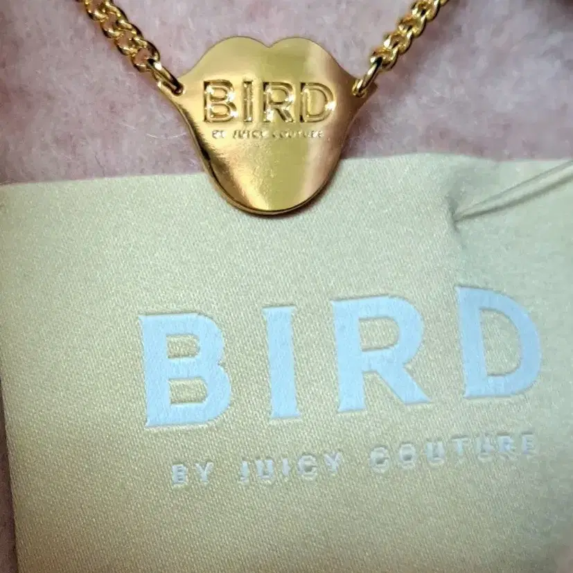 한섬 BIRD by Juicy Couture  코트