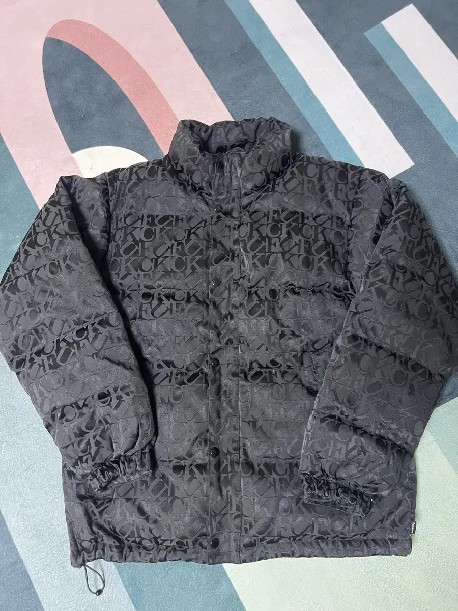 Supreme Fuck Jacquard Puffy Jacket