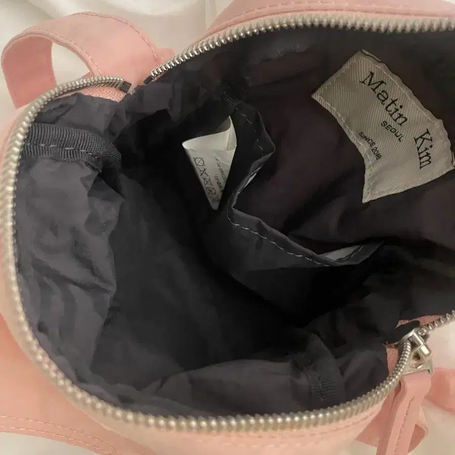 마뗑킴 CARGO CROSS MINI BAG IN PEACH