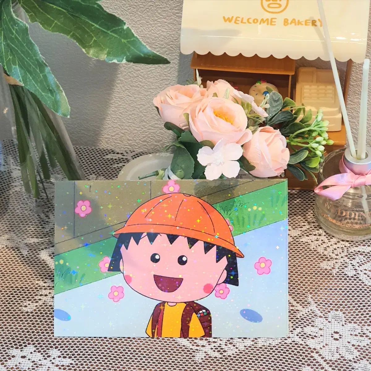 Maruko is a nine-year-old postcard.