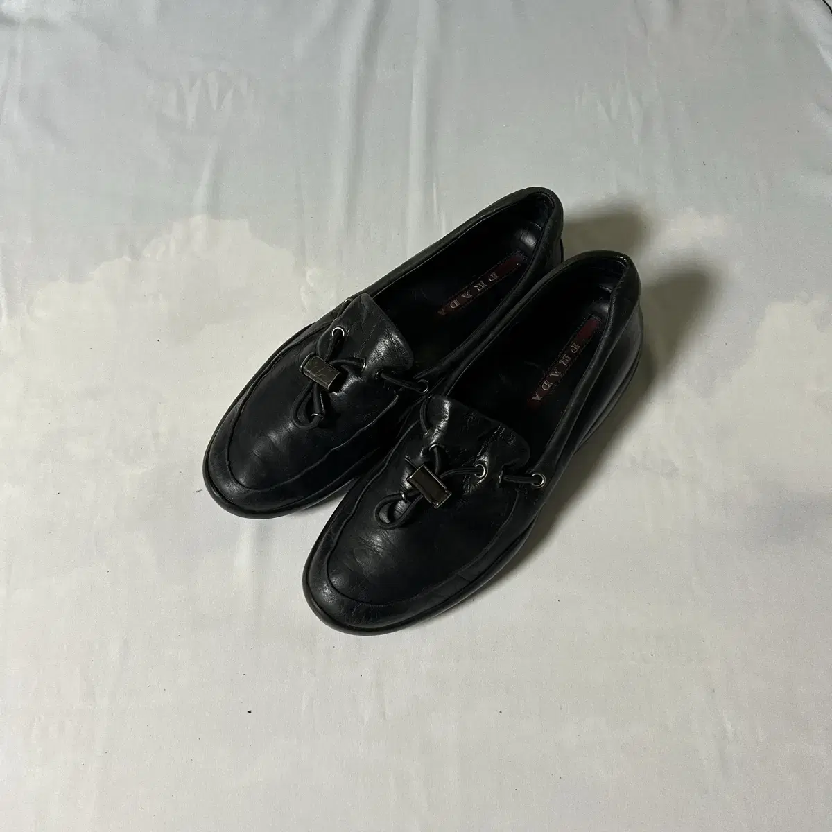 Prada nappa toggle slipon loafers