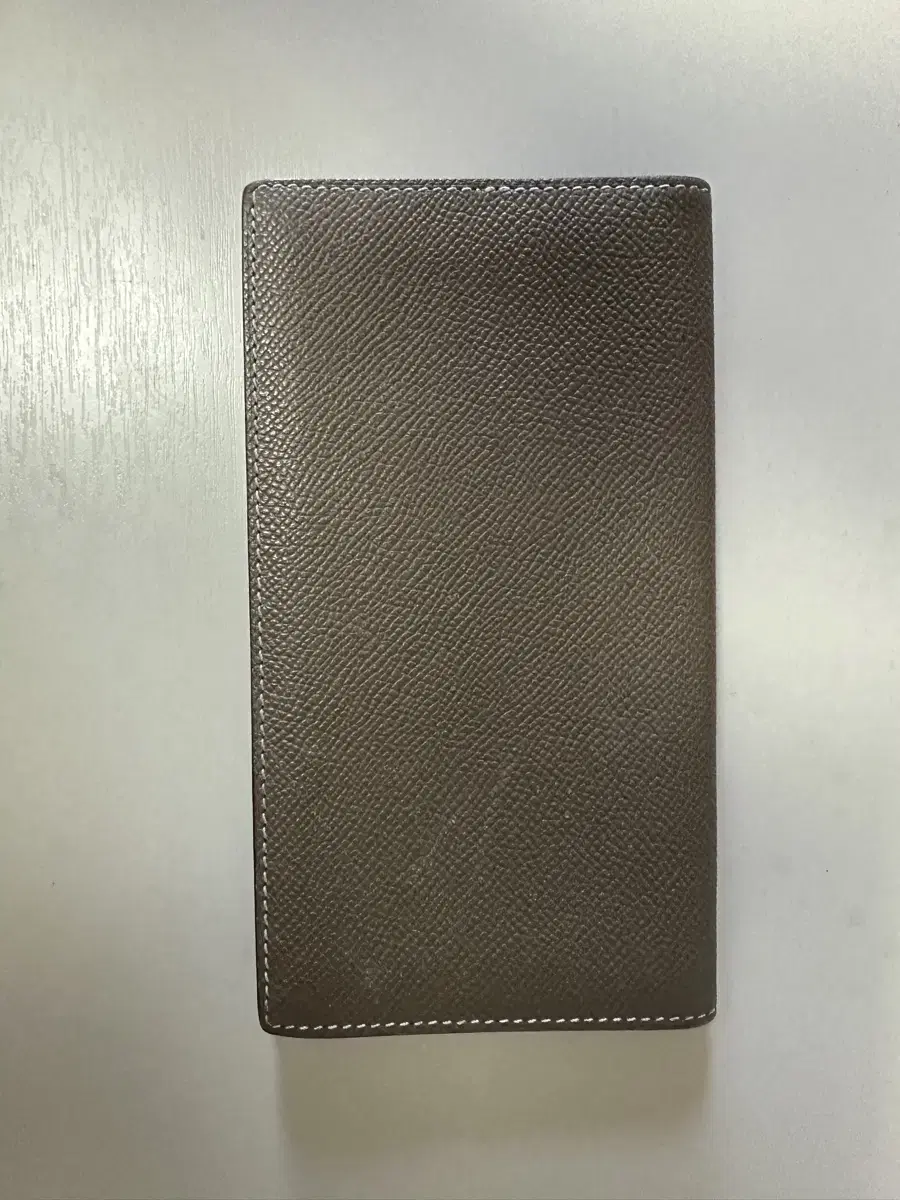 We sell Hermès long wallets