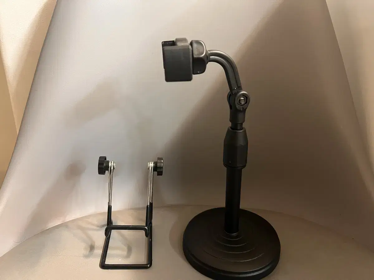 Adjustable cell phone stand holder, mounts in bulk