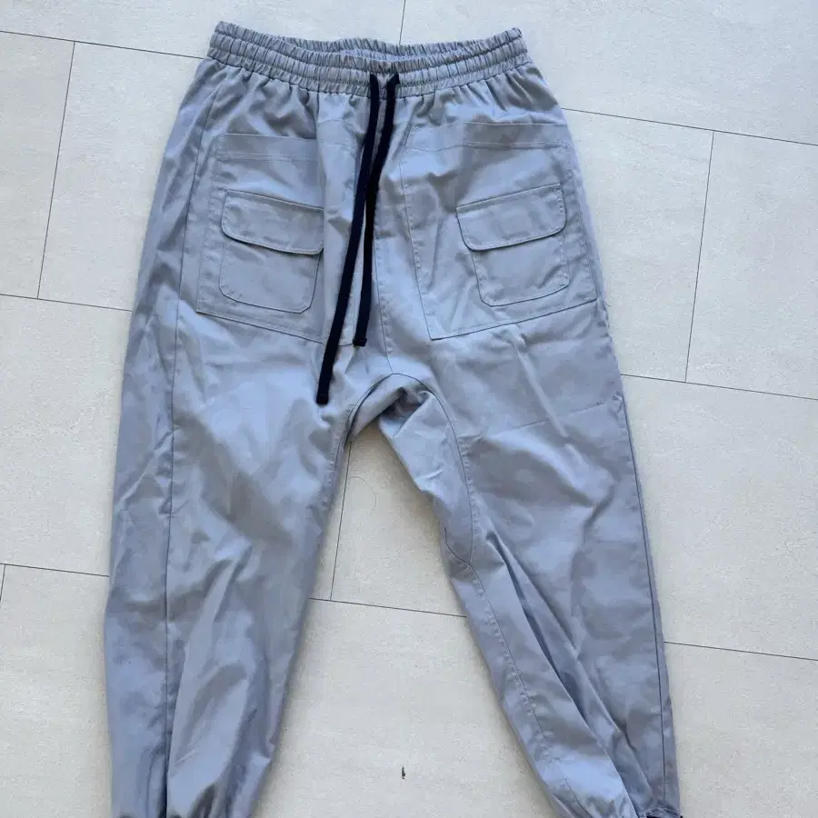 오메르타 2024 PFA Parasuit Pants Cement Grey