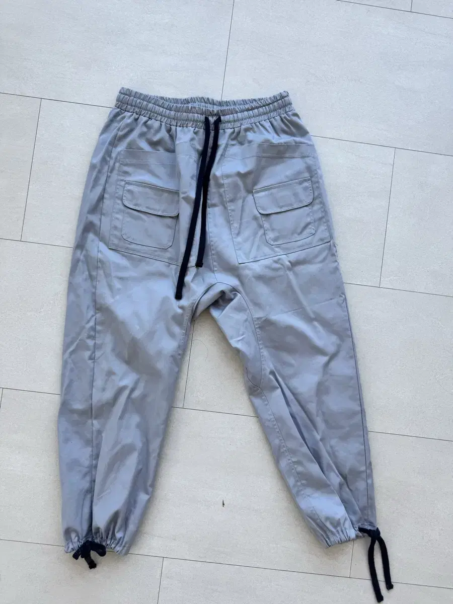 오메르타 2024 PFA Parasuit Pants Cement Grey