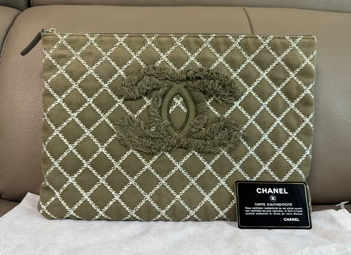 Chanel CC Logo Canvas Double-stitched Fabric Clutch in Khaki