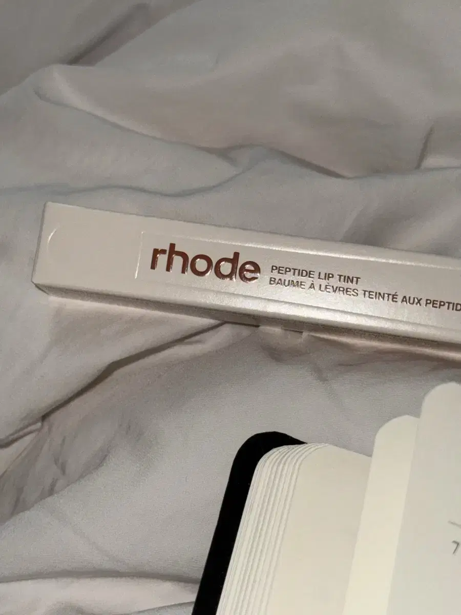 Rhode 시나몬 롤 립 트리트먼트