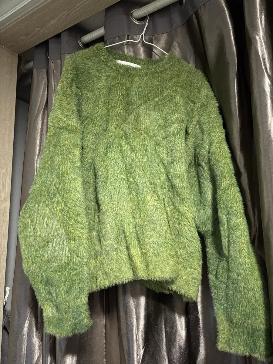 Nomanual green knit