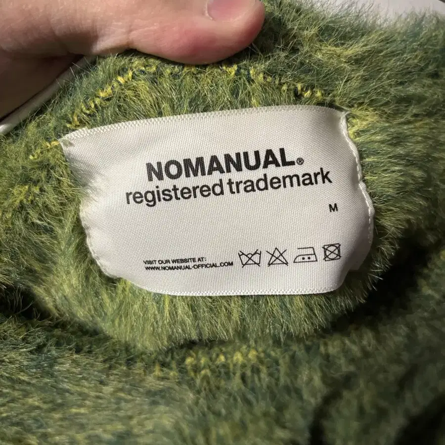 Nomanual green knit