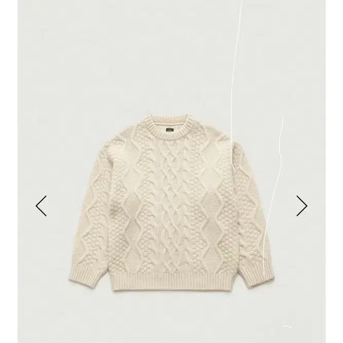 더바넷 니트 Lattice Pastry Cable Knit Sweater