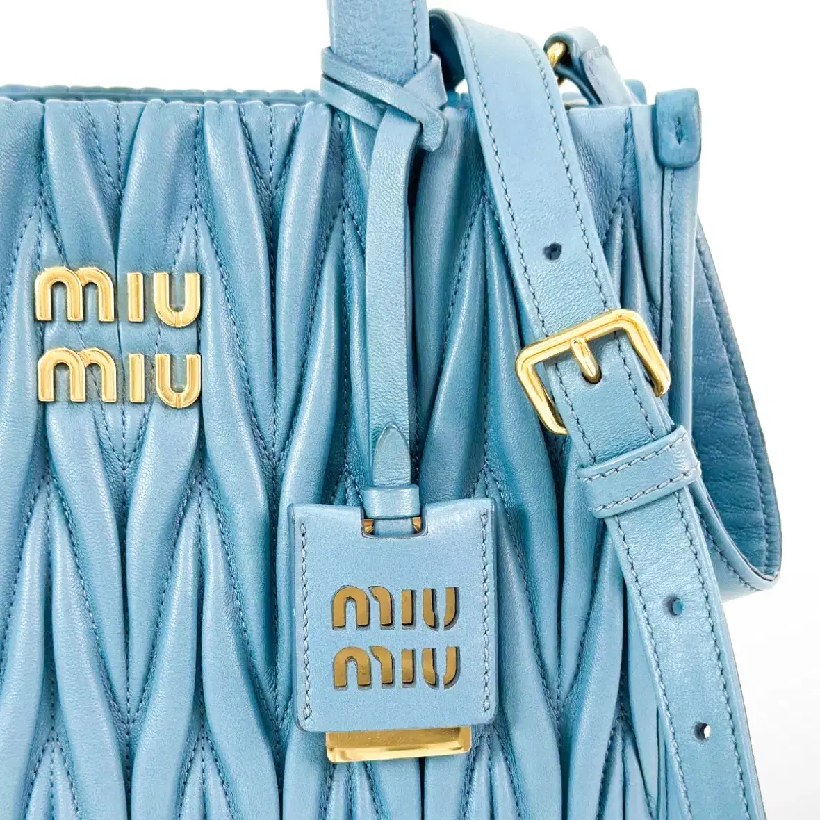 MiuMiu 미우미우 여성 마테라쎄 나파 가죽 레더 토트백 마리나블루