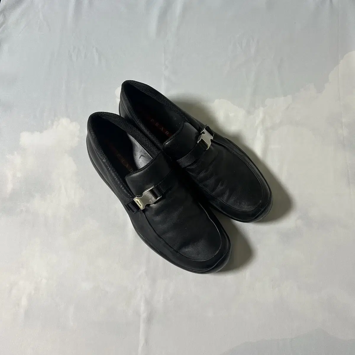 Prada sports buckle slipon loafers