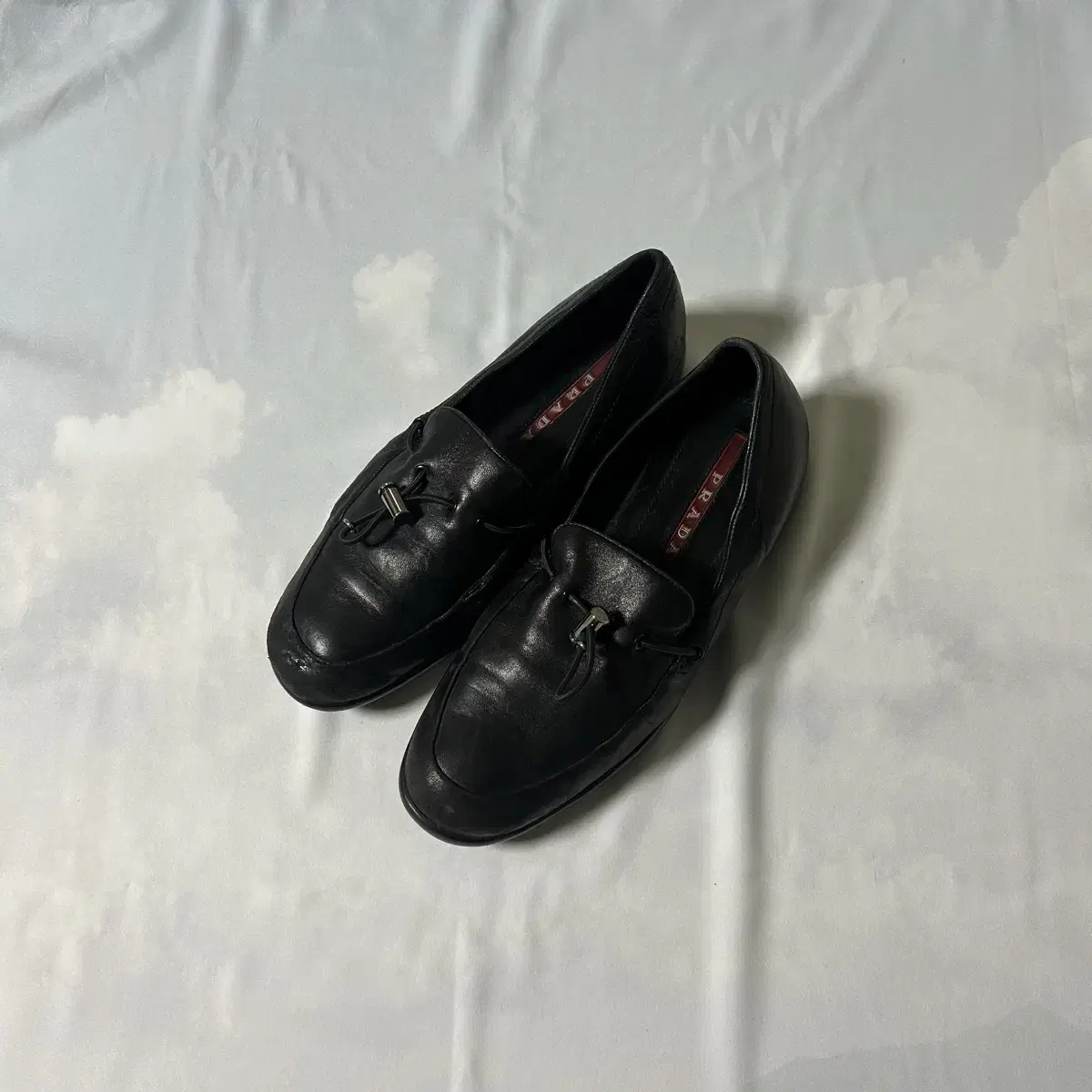 Prada nappa toggle slipon loafers