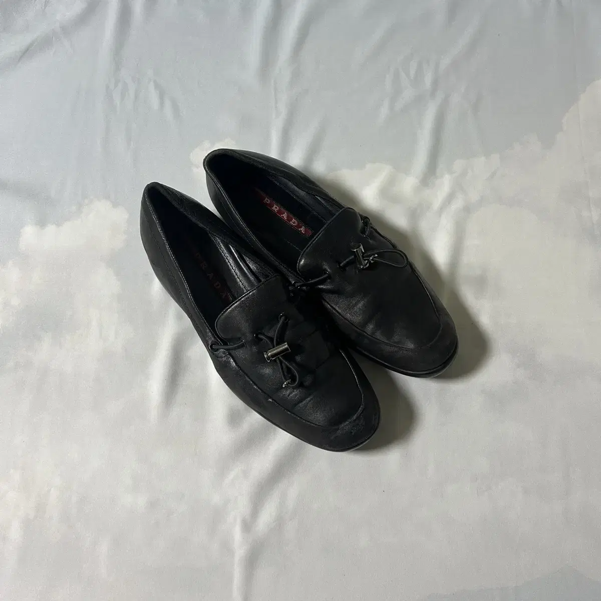 Prada nappa toggle slipon loafers