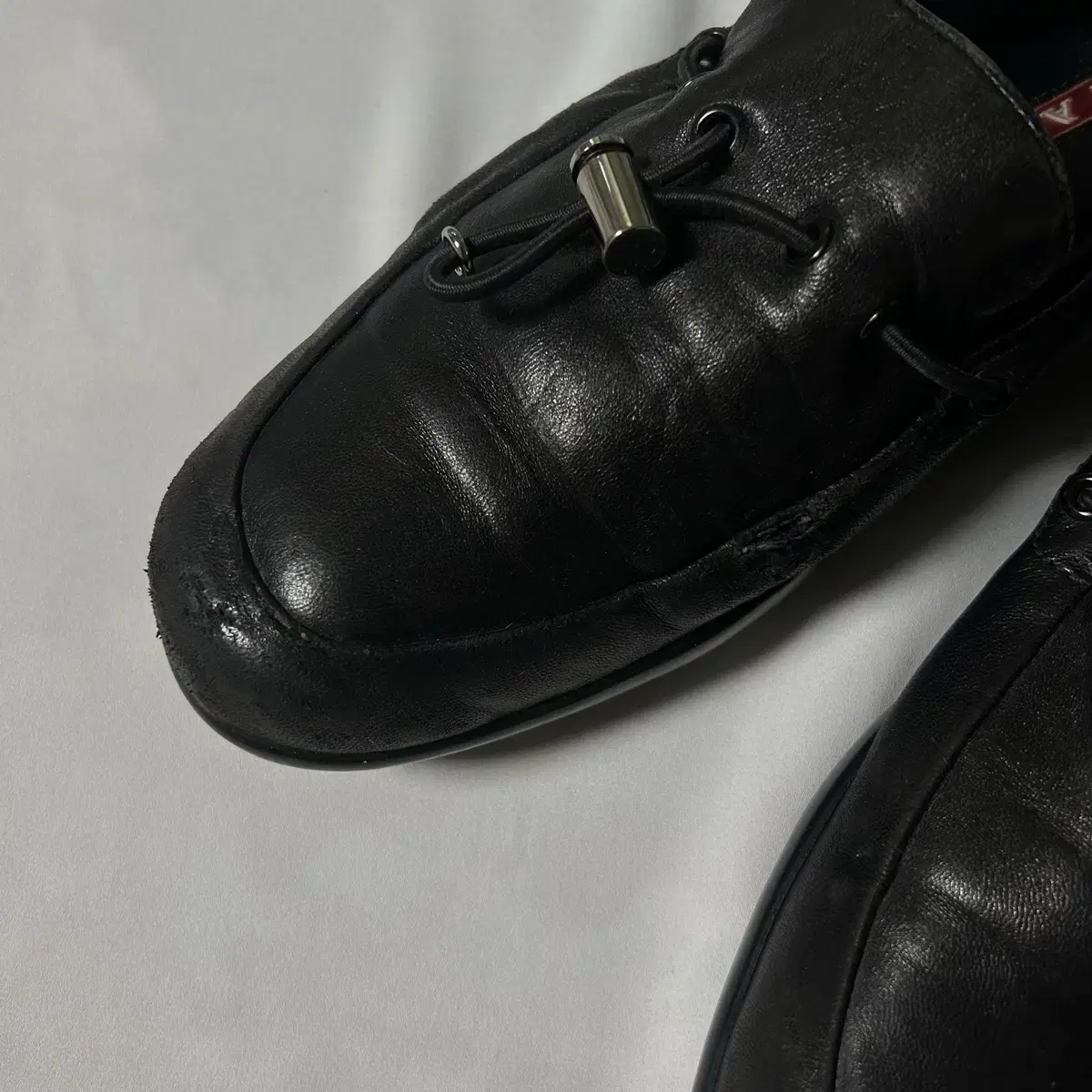 Prada nappa toggle slipon loafers