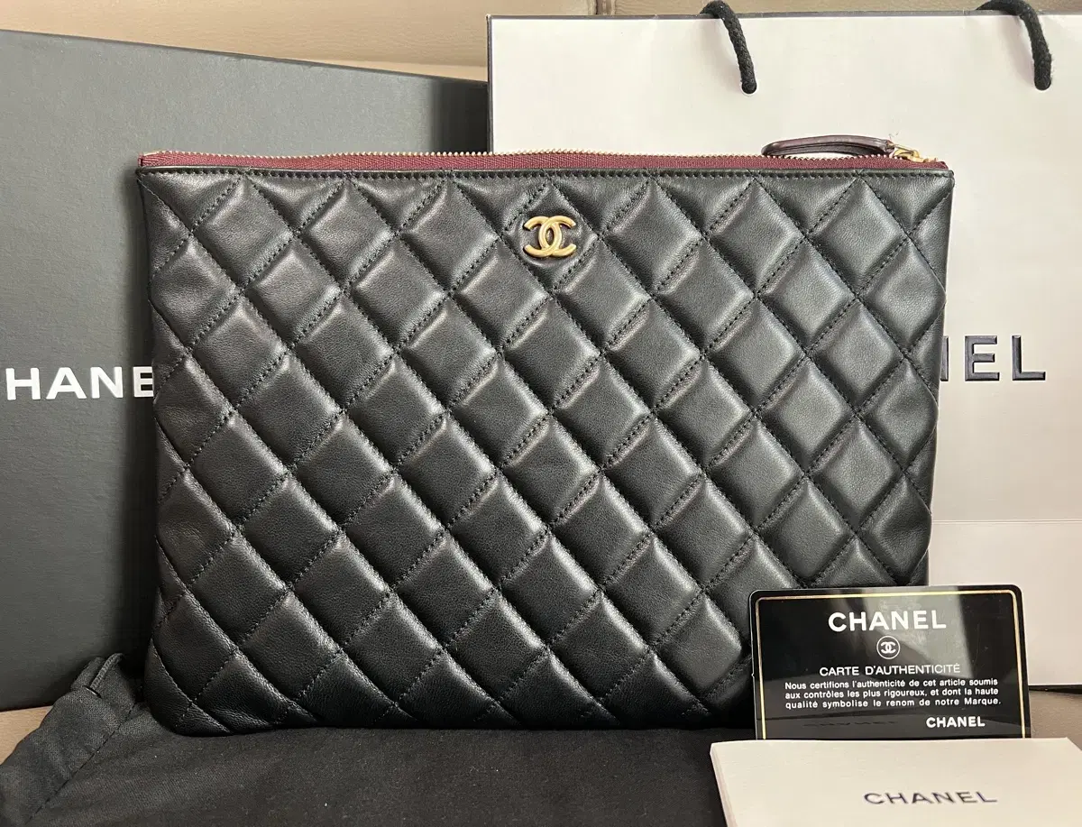 Chanel Classic Lambskin New Medium Clutch in Keum