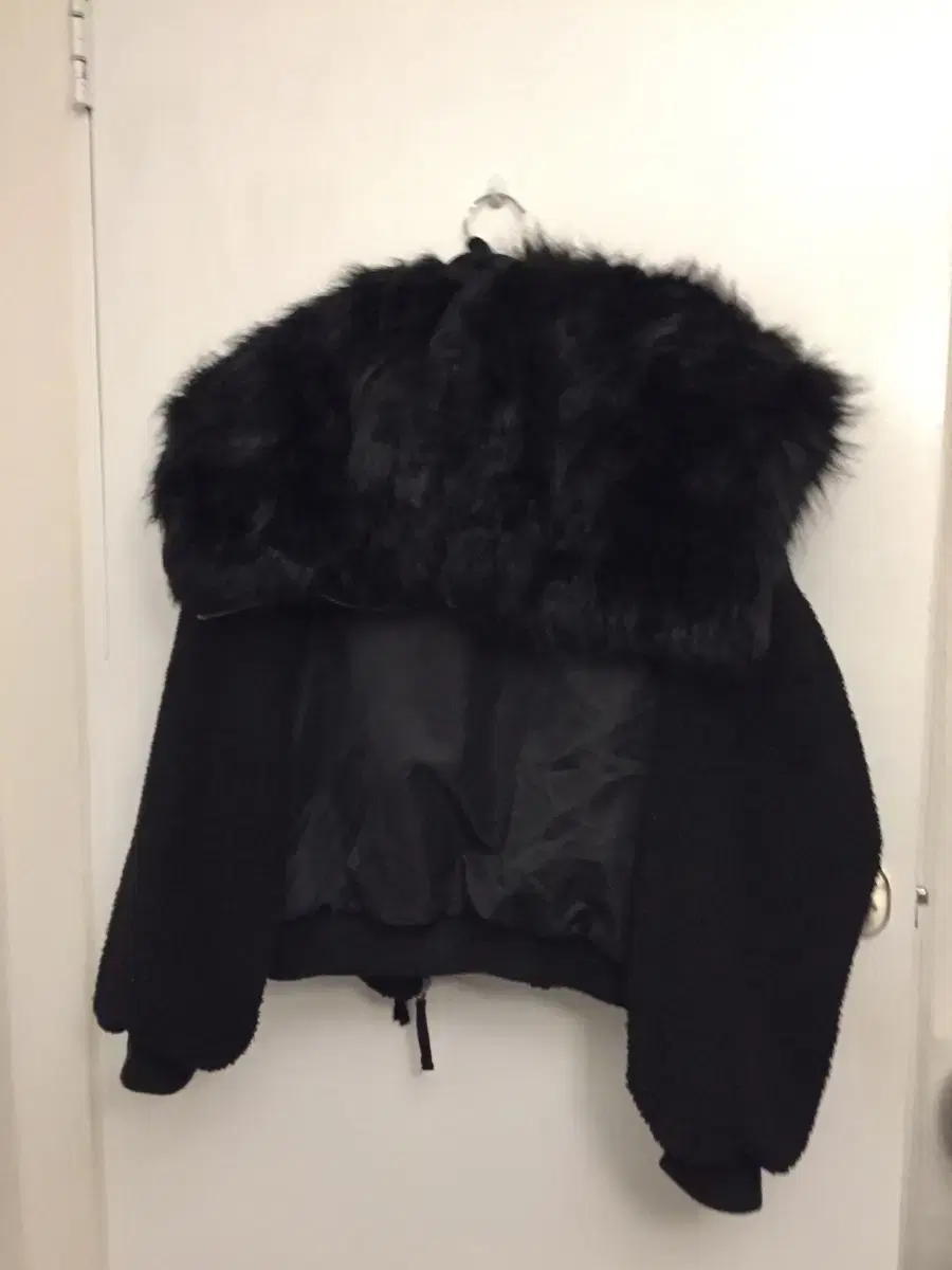 Punk gal, rock chic, fur, black padded jacket