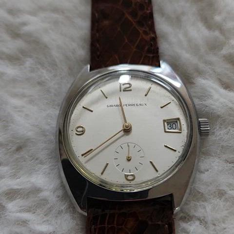 # 205 ) GIRARD PERREGAUX  HAND SWINDING