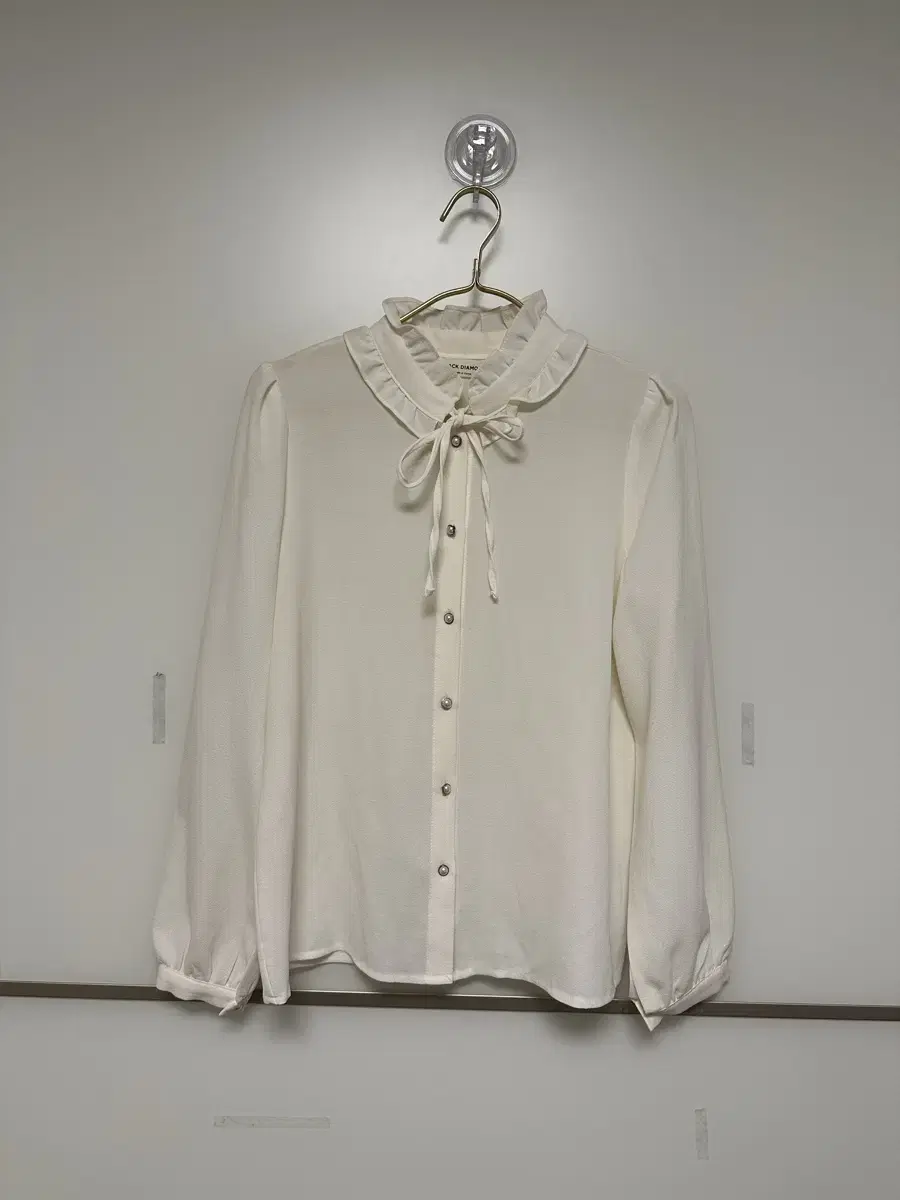 Black Diamond Ivory Neck Ruffle Blouse