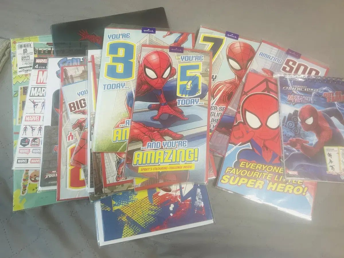 Spider-Man merchandise and comic book collection sealed unsealed in bulk