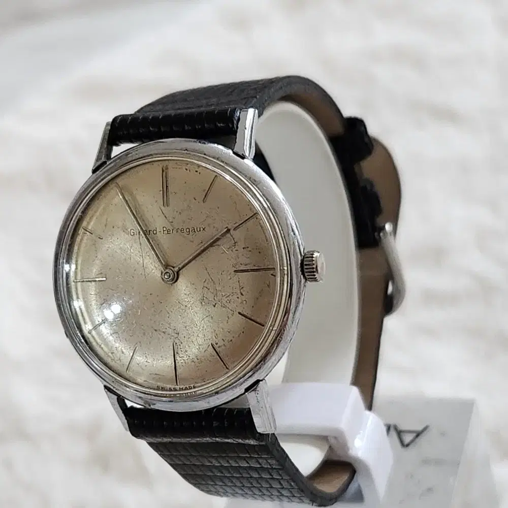 # 212 )  GIRARD PERREGAUX  PATINA