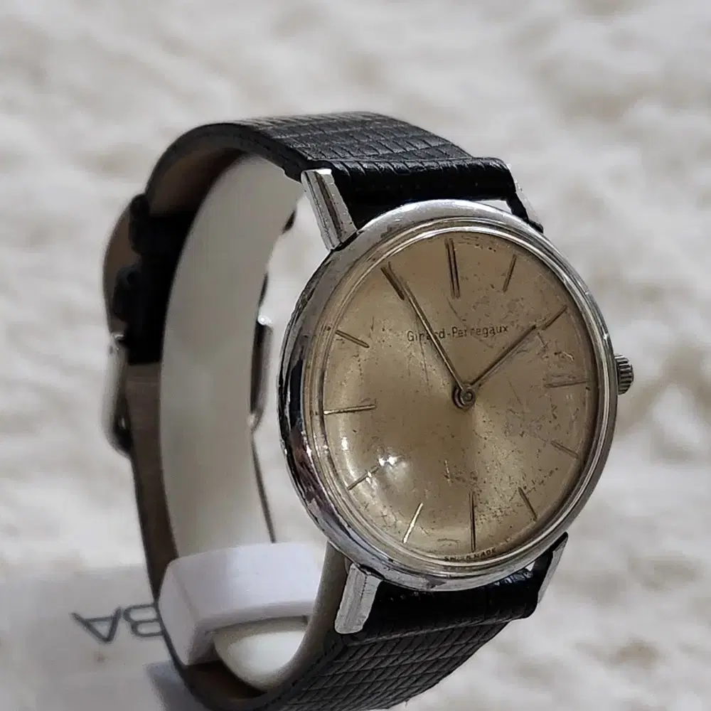 # 212 )  GIRARD PERREGAUX  PATINA