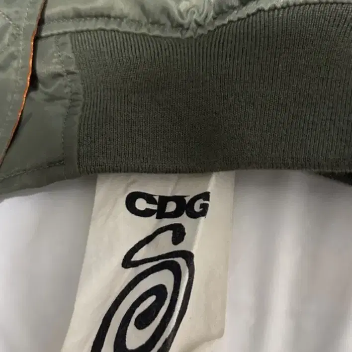 (L)스투시 x CDG MA-1 자켓 올리브