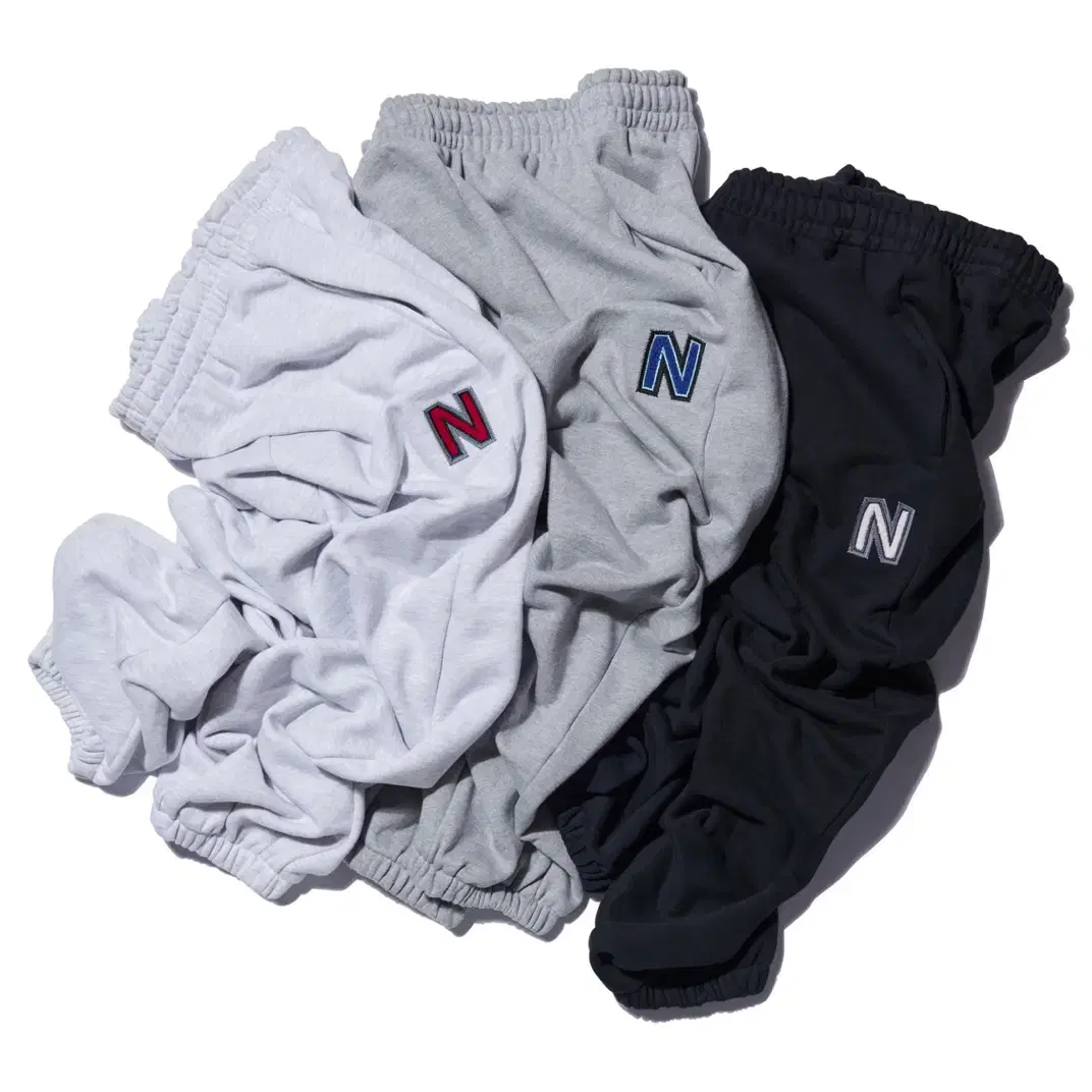 노매뉴얼 BOUCLE ARCH LOGO SWEATPANTS 블랙