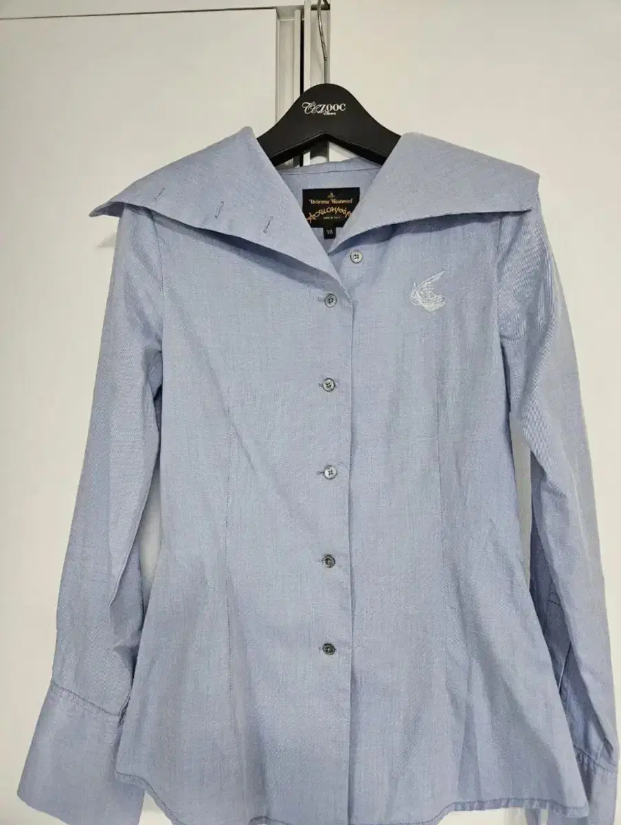 Vivienne Westwood sky blue shirt.