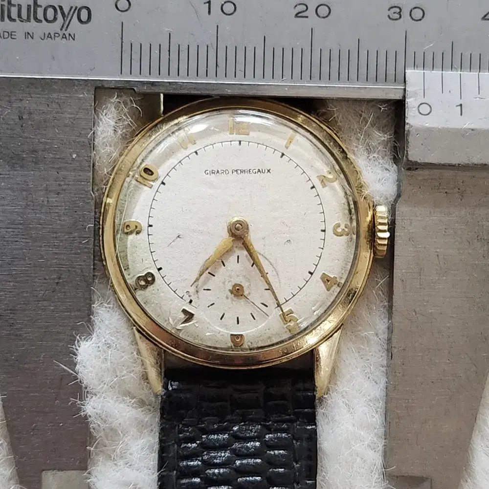 # 215 ) GIRARD PERREGAUX 14K YELLOW GOLD