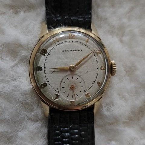 # 215 ) GIRARD PERREGAUX 14K YELLOW GOLD