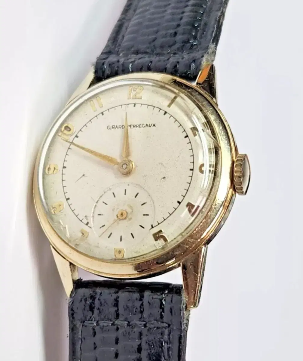 # 215 ) GIRARD PERREGAUX 14K YELLOW GOLD