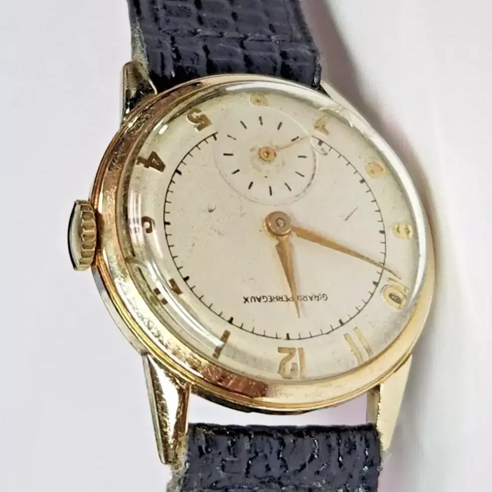 # 215 ) GIRARD PERREGAUX 14K YELLOW GOLD