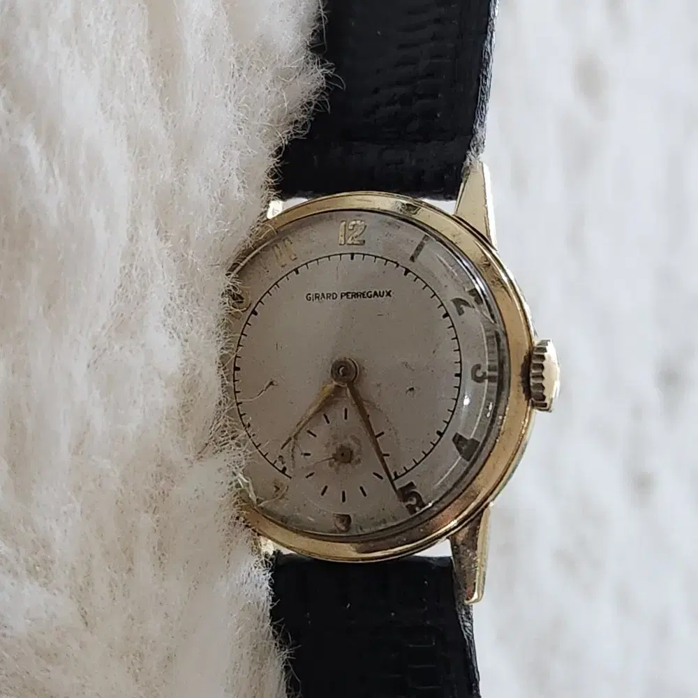 # 215 ) GIRARD PERREGAUX 14K YELLOW GOLD