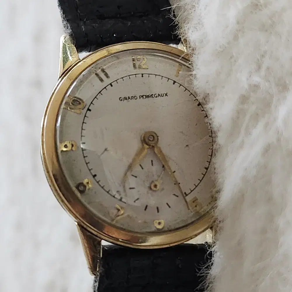 # 215 ) GIRARD PERREGAUX 14K YELLOW GOLD