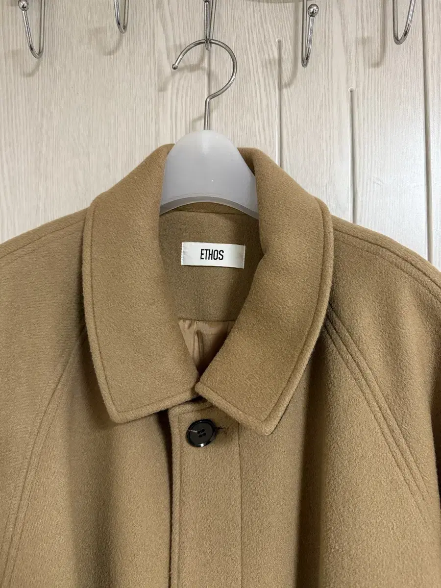 Etos Reglan Coat Camel sells