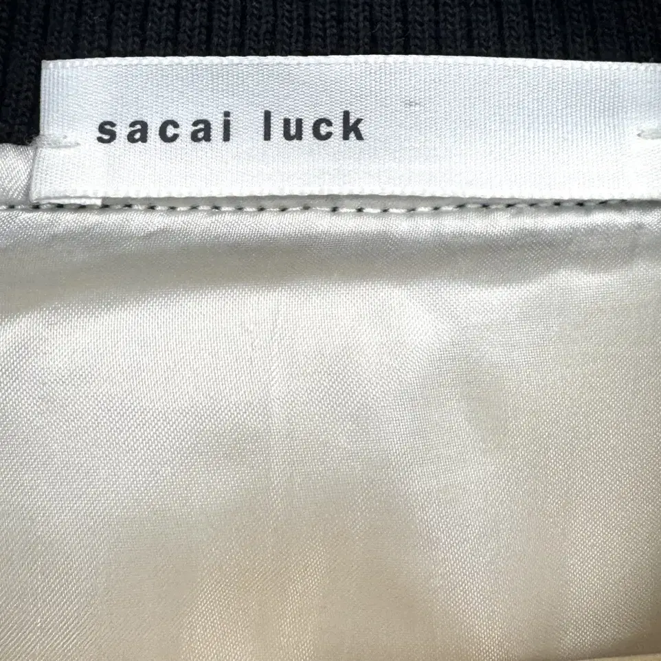 SACAI LUCK 사카이럭 베이지 체크 스테디엄 가죽 자켓