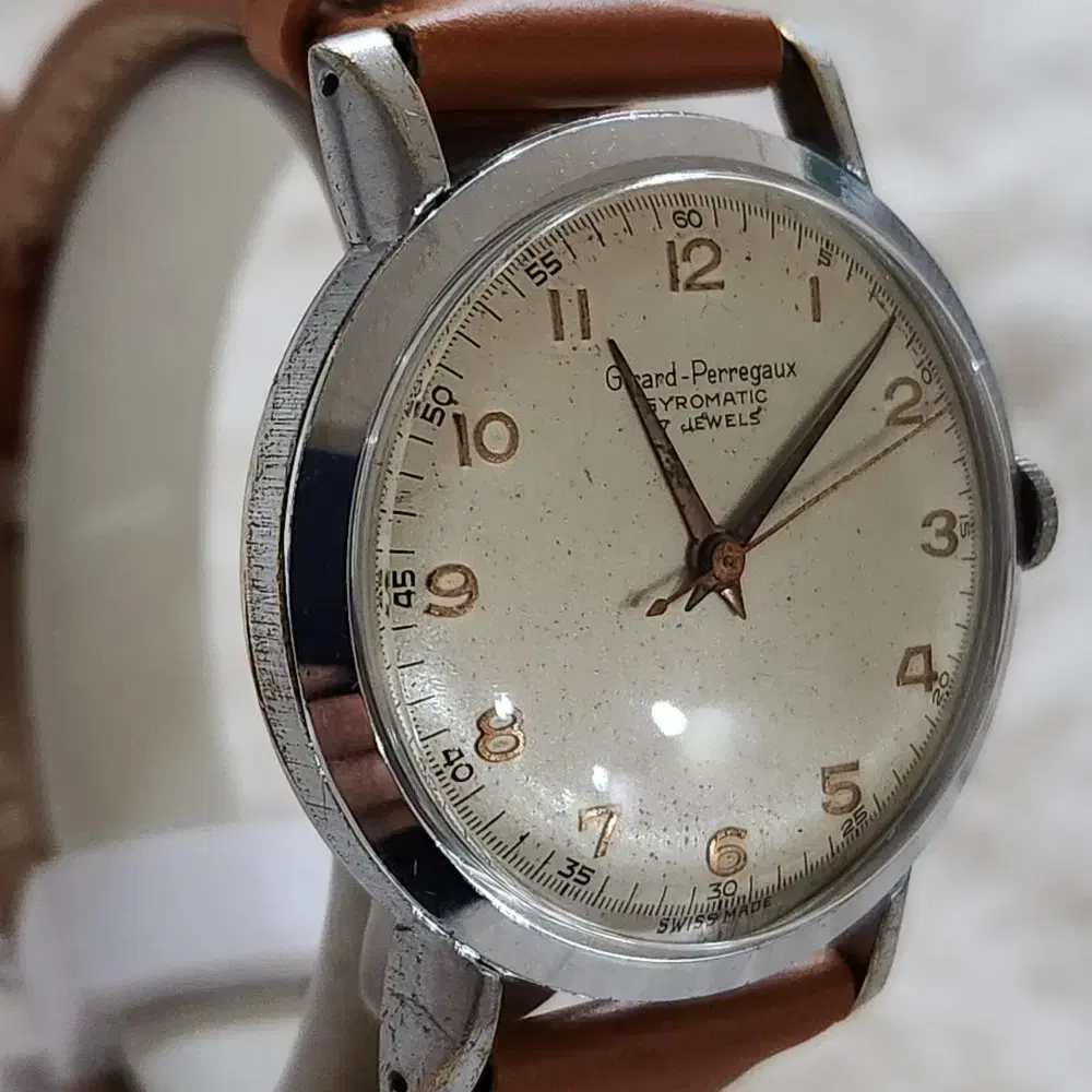 # 219 )  GIRARD PERREGAUX GYROMATIC